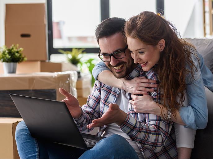 couple-getting-approved-for-financing-from-laptop